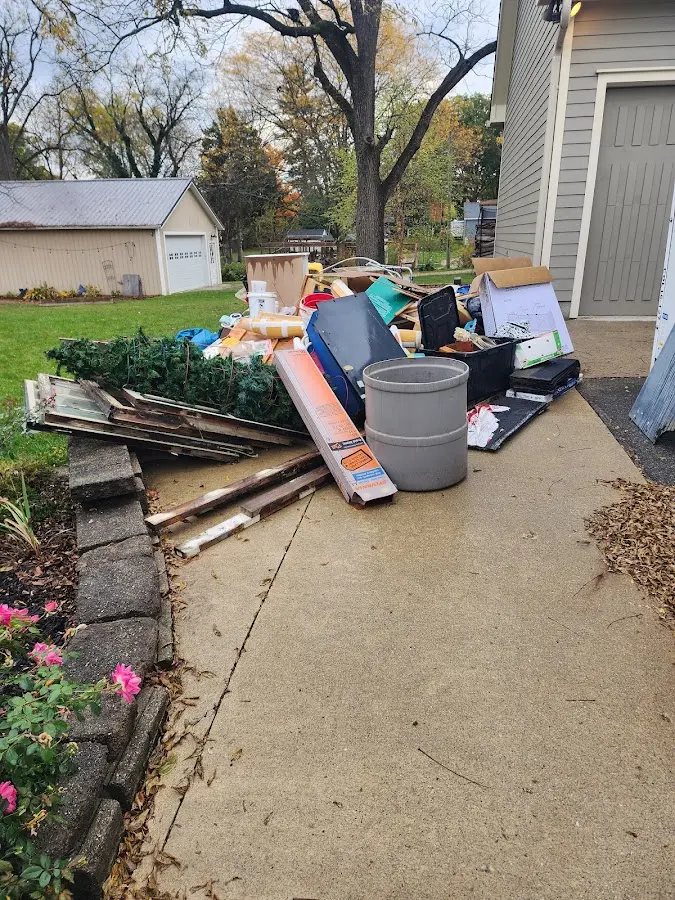 Dumpster being loaded with debris for 30 Yard Dumpster Rental in Nottingham